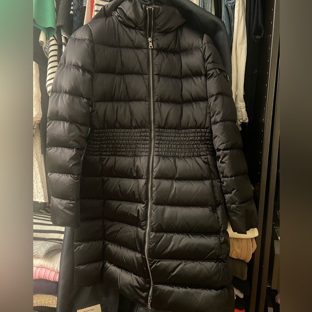 Prada long puffer coats.